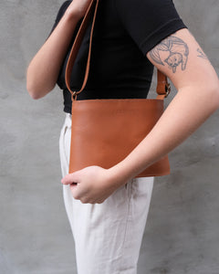 ANTOINE TRAPEZE BAG IN COGNAC LEATHER 